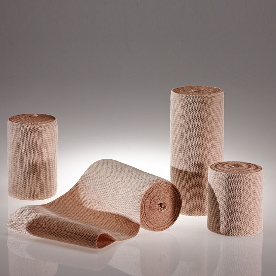 ELASTUS Kurzzugbinden hautfarben, 5 m x 6 cm (10 Stck.) mit Verbandklammern